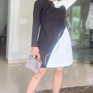 Embrace the Monochrome Magic @chandnigirdhar in our Hand embroidered Dress